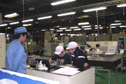 Children learning by hands-on factory work